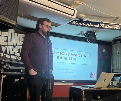 Photo of Mark giving a public talk at Science on Tap DC, 2026